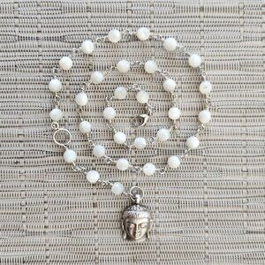 MOTHER OF PEARL NECKLACE WITH STERLING SILVER BUDDHA PENDANT